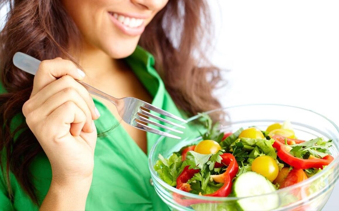 girl eating vegetable salad on 6 petals diet